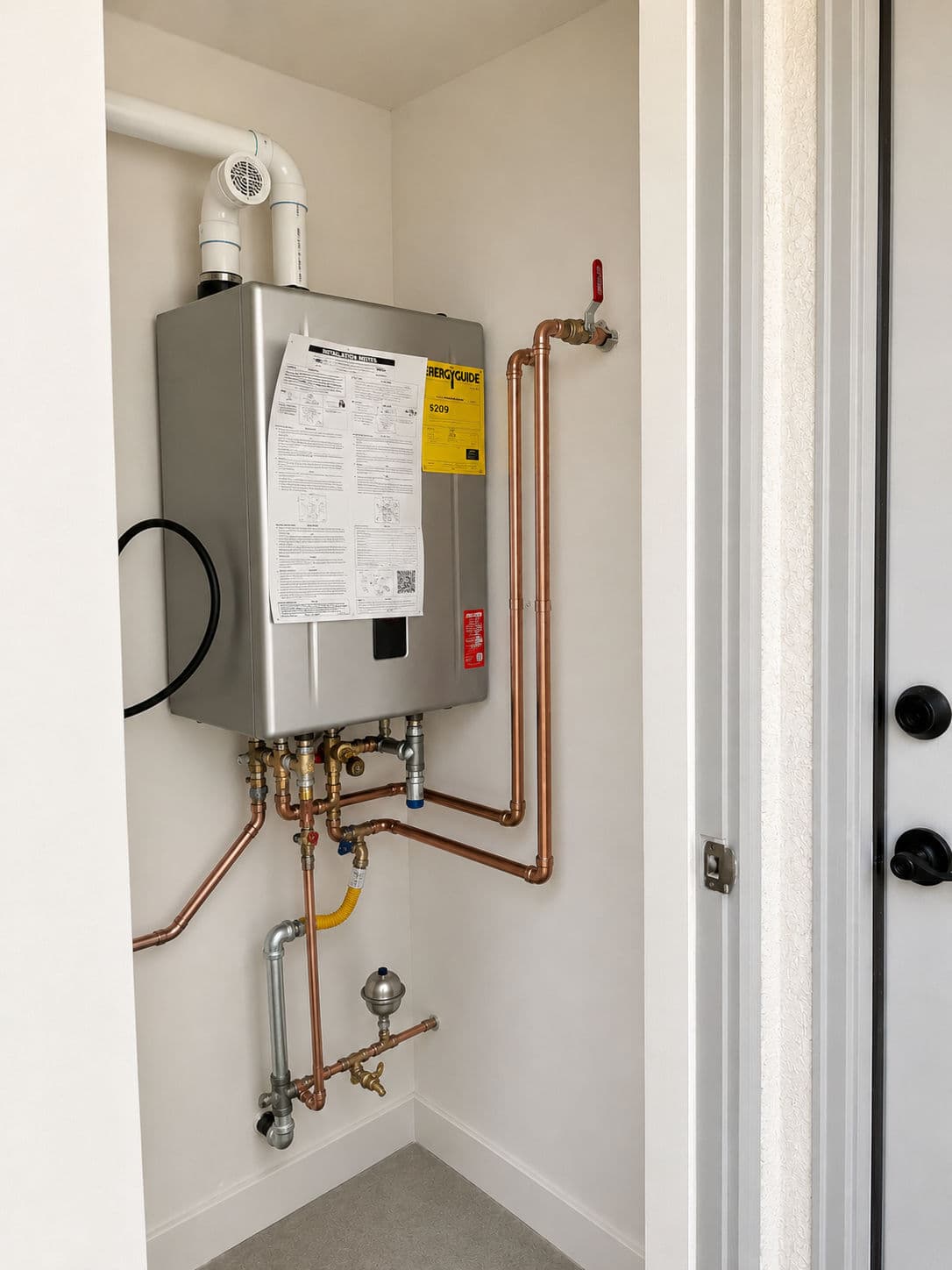 Gallery photos for Tankless Water Heater Installation That Frees Up Space and Cuts Energy Waste: Image #1